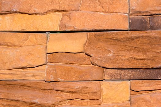 Photo stone wall of red masonry texture