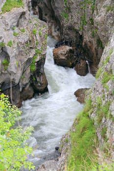 Photo of river in Caucasus mountains in summer