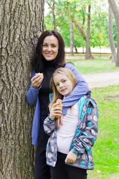 Photo of mother and daughter are eating