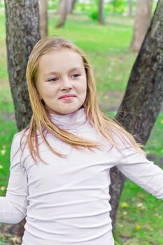 Photo of cute playing girl in summer