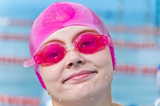 Photo of cute girl in swimming pool