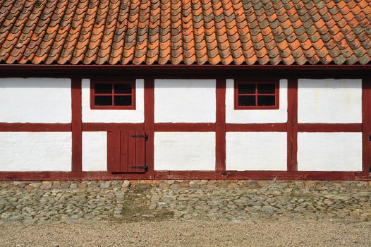 Closeup of a old well kept red and white barn, Mölle in Sweden.