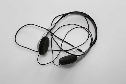 A pair of headphones for connection to a music player or phone