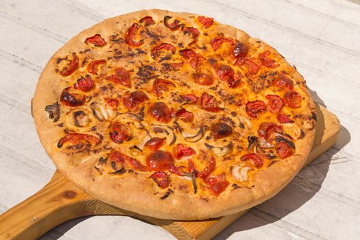 Focaccia with tomatoes and onion