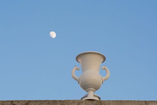 ceramic vase with moon in the sky