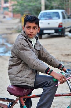 Jodhpur, India - January 2, 2015: Portrait of Indian child in a village in Jodhpur, india. Jodhpur is the second largest city in the Indian state of Rajasthan with over 1 million habitants.