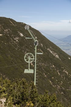 A pole for cableway transportation on a mountain
