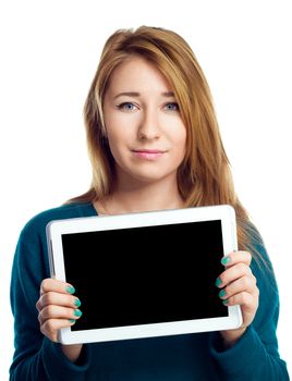 Young cheerful woman is showing blank tablet, isolated over white