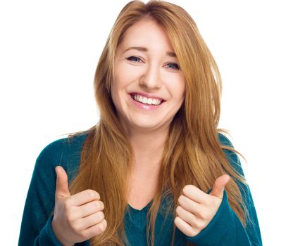 Young woman is showing thumb up gesture using both hands, isolated over white
