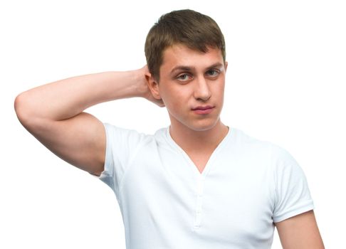 Portrait of young guy in white shirt over white background