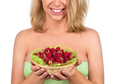 Basket with raspberry in woman hands isolated on white