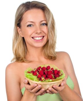 Close up of smiling woman holding raspberries isolated on white