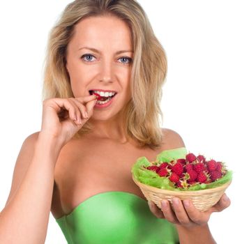 Close up of smiling woman holding raspberries isolated on white