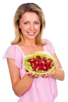 Close up of smiling woman holding raspberries isolated on white