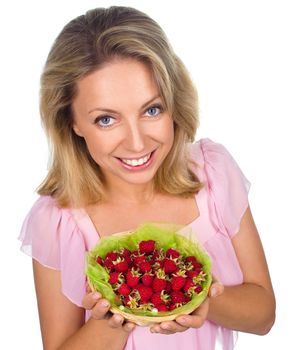 Close up of smiling woman holding raspberries isolated on white