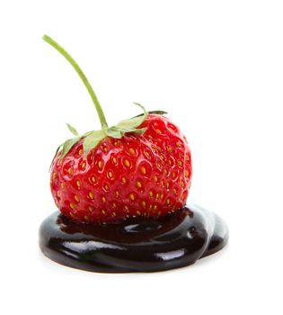 Chocolate-dipped strawberry on a white background