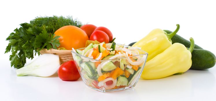 Vegetable and salad in the bowl isolated on white