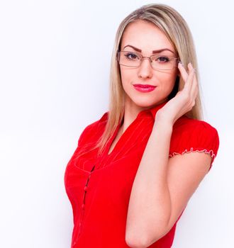 Young business woman in red dress isolated over white background
