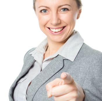 Portrait of young business woman pointing finger at viewer, isolated over white background