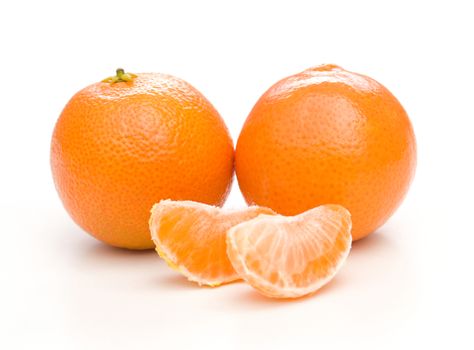 Orange mandarin or tangerine fruit isolated on white background