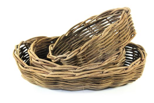 braided wicker baskets against a bright background
