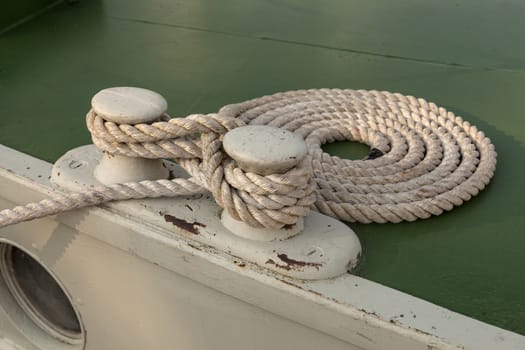 A rope on a moored boat nicely stored