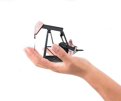 hand hold pumpjack isolated on white background