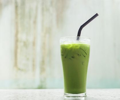 Ice milk green tea, famous drink in Thailand, Grunge background