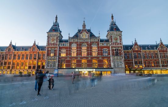 Amsterdam, Netherlands - May 8, 2015: Passenger at Amsterdam Central Train Station on May 8, 2015 in Amsterdam, Netherlands. Amsterdam Central Station is used by 250,000 passengers a day.