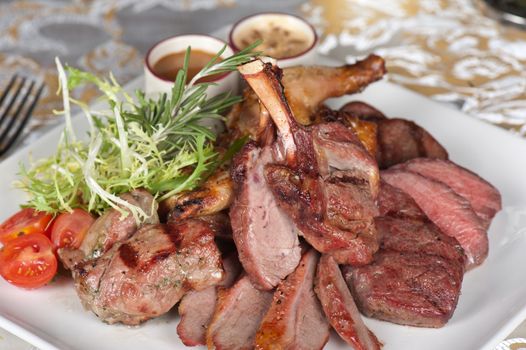 grilled meat with herbs and vegetables