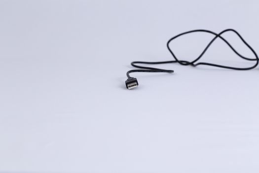 An USB cable for different devices, computer, smartphones, tablets
