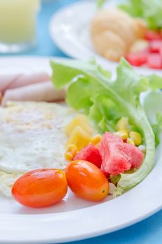 Big set of  breakfast cuisine on white dish