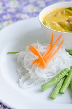 Thai rice vermicelli served with yellow curry