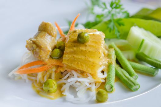 Thai rice vermicelli served with yellow curry