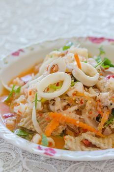 close up spicy mix salad with seafood  and  fresh vegetable