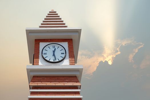 clock tower with beautiful sunbeam background