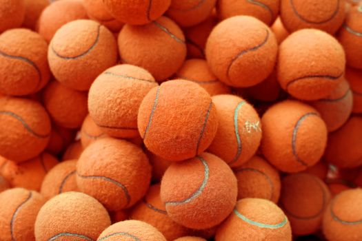 exotic red tennis ball as sport background