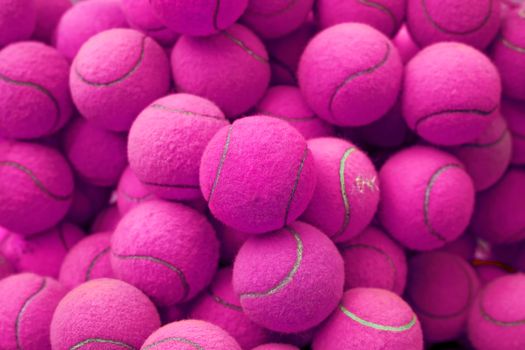 exotic purple tennis ball as sport background