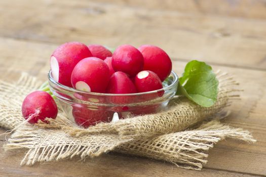 Fresh radishes in a bowl 