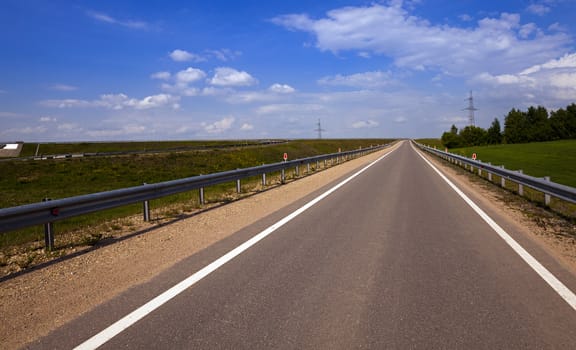   the small asphalted road which is in rural areas. Belarus