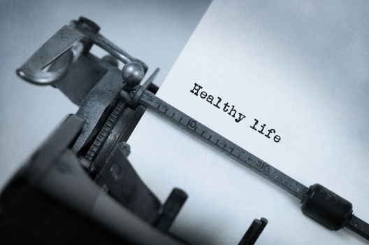 Vintage inscription made by old typewriter, Healthy life