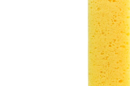 Yellow Sponge Close-up with space on white background (isolated)