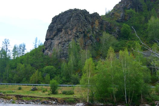 The Tempestuous mountain river in mountain.Year landscape