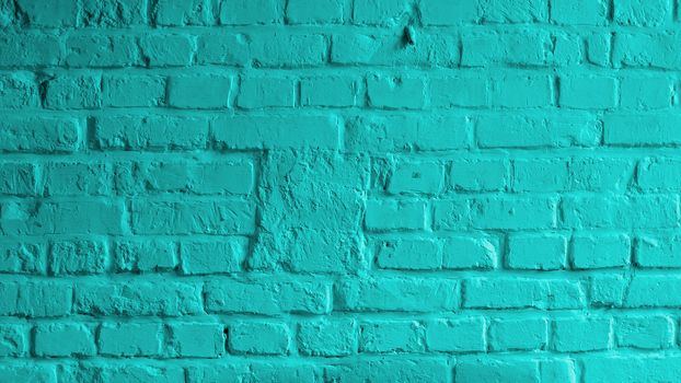 Background of Brick Wall Painted with Mortar Turquoise Color closeup