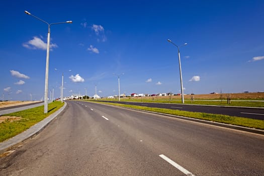   the constructed new road in the new district of the city under construction