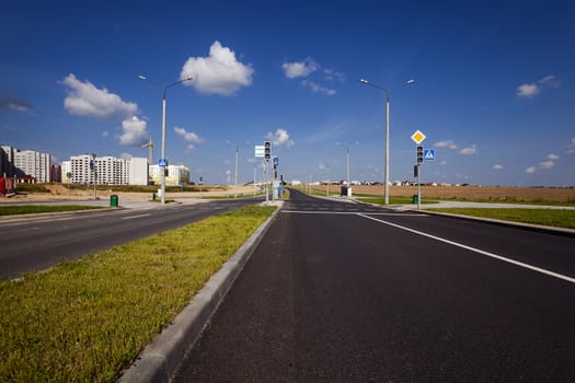   the constructed new road in the new district of the city under construction