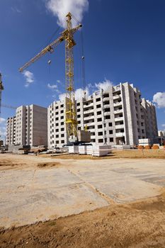  a construction site on which construction of a new multystoried house is carried out.