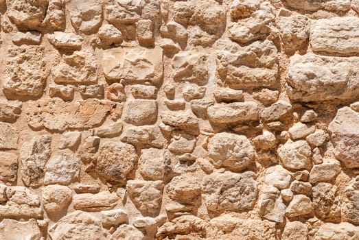 Old wall made of the Jerusalem stone. Israel