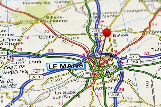 Closeup of Le Mans. Le Mans is a city and municipality in northwestern France on the River Sarthe, about 210 kilometers southwest of Paris.