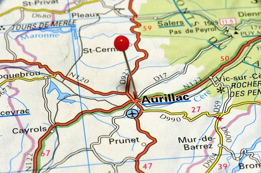 Close-up of the French town of Aurillac in France on a road map photographed from above